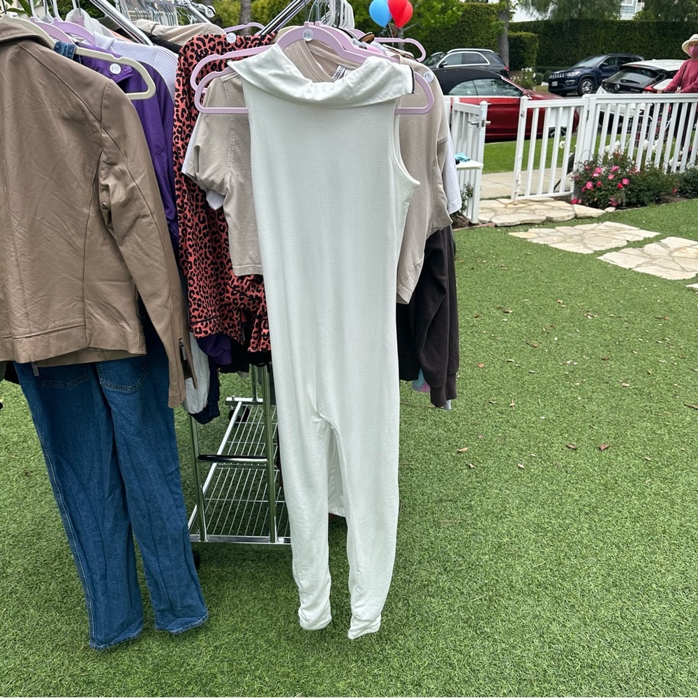 Small white sleeveless maternity jumpsuit/bumpsuit